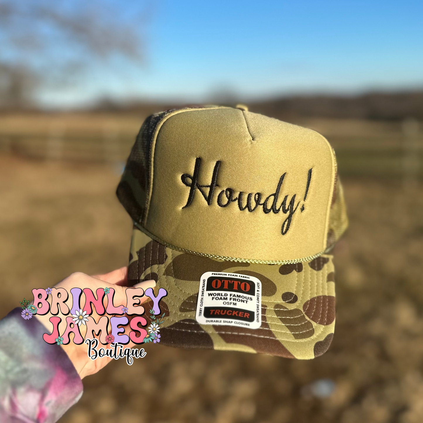 Howdy - Camo Embroidered Trucker Hat